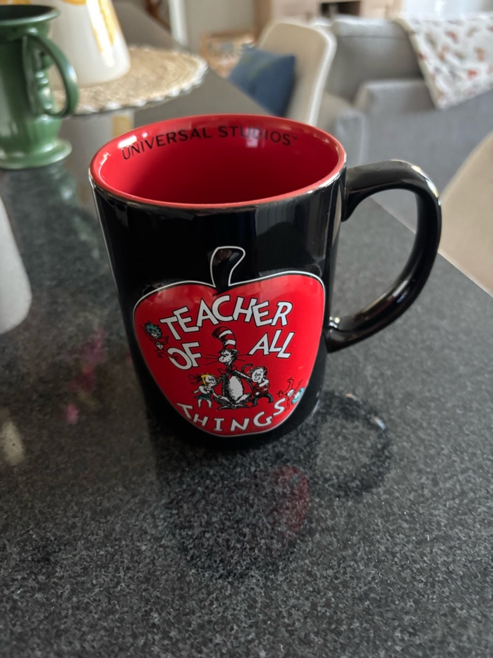 Universal Black and Red 'Teacher of All Things' Ceramic Mug